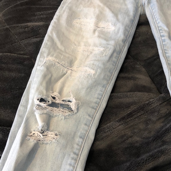 Light Wash Distressed Jeans - Picture 2 of 4